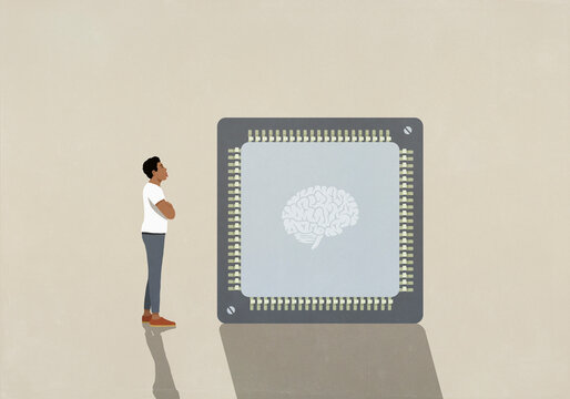 Man staring at large AI brain microchip
