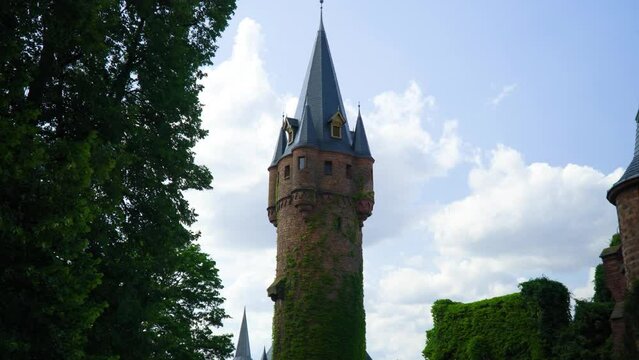 fairy tale like tower magical out of this world super realistic of Rapunzel trapped in a tower story for kids imaginary tall alone mystical place for princess to dwell fictional forest harry potter