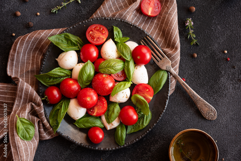 Canvas Prints Caprese salad with mozzarella cheese and tomatoes of Italian cuisine