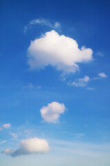 Fluffy Pure White Cumulus Clouds Floating on Vi Blue Sky