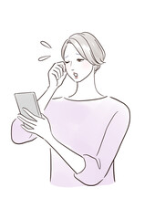 スマホが見えづらくて困るミドル世代の女性