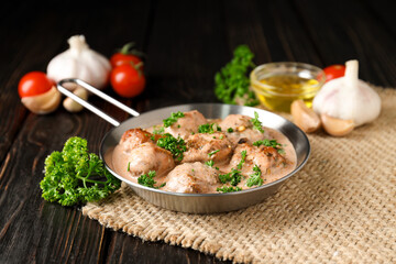 Tasty meat food and homemade food concept - meatballs