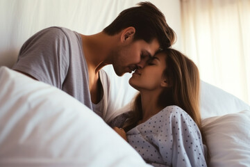 Lovers couple kissing in the bed , boyfriend and girlfriend intimate moments view