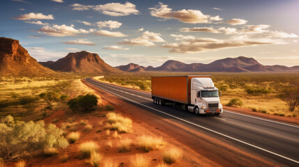 Huge semi-truck crossing the Australia northern territory bush landscape on an empty road - obrazy, fototapety, plakaty