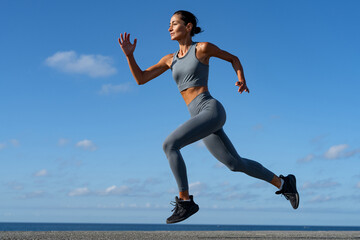 athletic brunette girl doing fitness doing exercises leading a healthy lifestyle