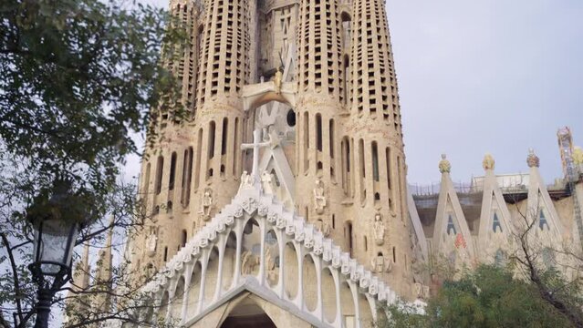 view of the sagrada familia from the park, barcelona, ​​spain