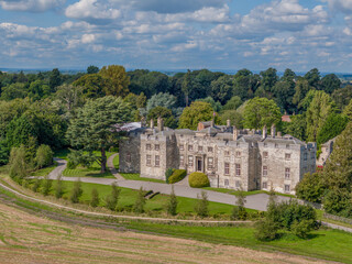 Fototapeta na wymiar Hazlewood Castle near Leeds and York. West Yorkshire Castle dating back to Norman times. English Castle and grounds aerial view on a sunny day