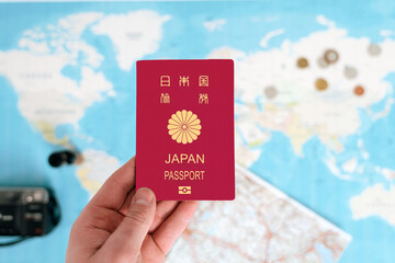 Japan Passport holding in hand