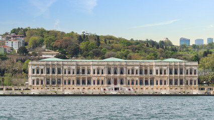 Naklejka premium View from the Bosphorus of Ciragan Palace, currently serving as a luxury hotel located in Istanbul, Turkey, built in the 19th century and is now a popular tourist destination