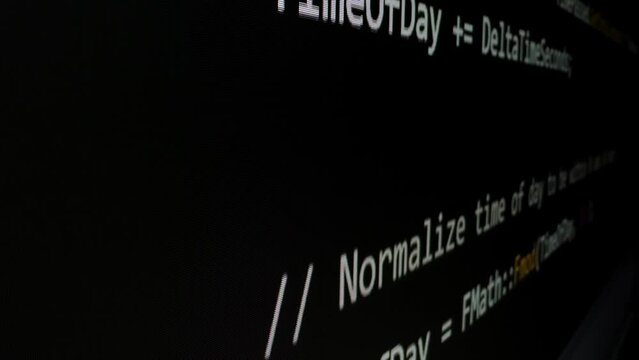 Closeup macro shot movement of coding script moving across LED screen with real-time AI-generated typing, showcasing advanced AI learning in optimization, debug and coding for software development.