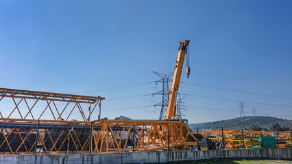 Fototapeta na wymiar steel construction, industrial crane system, mobile crane