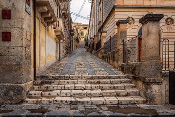 Fototapeta na wymiar Typical Street in historic part of Noto city, Sicily in Italy 