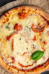 pizza four cheeses portioned slice cheese ready to eat appetizer meal food snack on the table copy space food background rustic top view