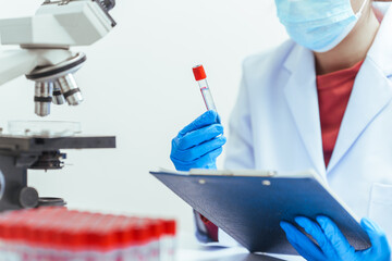 Fototapeta premium Scientist people working perfumes, fragrances, aromatics Laboratory lab test, fragrance, flavor testing can help you determine ingredients, used to create particular flavor or fragrance.