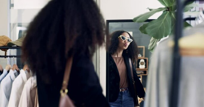Woman, shopping and summer sunglasses in mirror, choice and thinking with style idea in mall. Girl, fashion and customer experience in store, pout and decision for design, frame or product quality