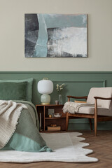 Interior design of cozy bedroom interior with mock up poster frame, bed, sage bedding, beige plaid,...