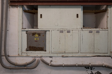 Detail of the three-phase electrical panel of an old abandoned factory