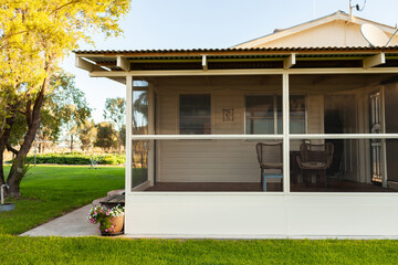 Farmhouse with fly screen veranda enclosed deck
