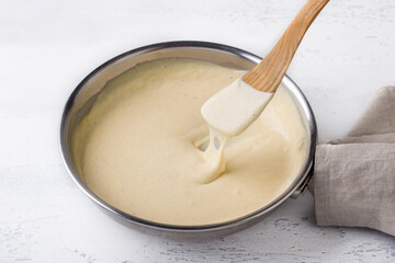Making Pasta Cheese Sauce, Step by Step, DIY. Step 10. Ready sauce in a frying pan - 642124438