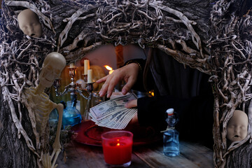 seance in salon of soothsayer, female hands of psychic doing witchcraft passes with money, esoteric...