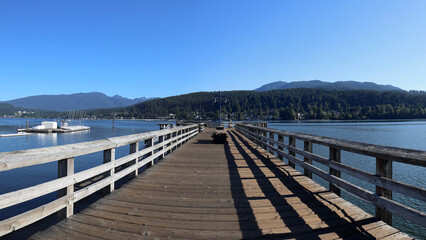 Fototapeta na wymiar Perspective of pier at Rocky Point Park in Port Moody