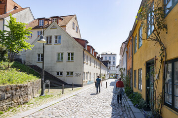 Fototapeta na wymiar Walking in Flensburg's streets along the sea side, Germany 
