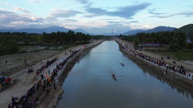Gorontalo, Indonesia - August 19 2023: View of lomba balap perahu or traditional boat race. traditional boat race to celebrate independence day of Indonesia
