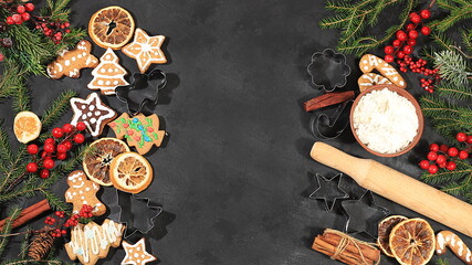Christmas New Year food, traditional holiday gingerbread and tangerines with fir branches, pine...