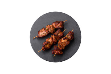 Delicious grilled chicken, turkey or pork skewers with salt, spices and herbs