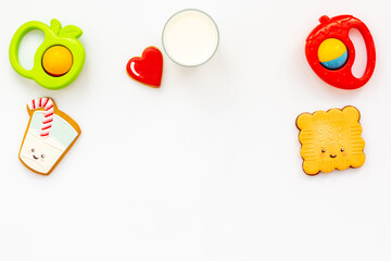 Funny cookies in shape of milk in glass and biscuit with kids toys