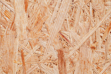 Chipboard plywood, surface close-up, uniform texture background