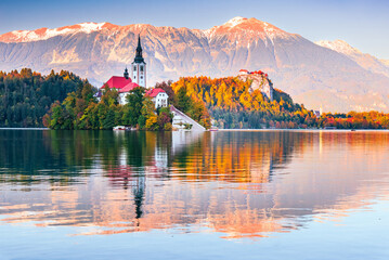 Bled, Slovenia -  Julian Alps and Church Santa Maria, beautiful autumn sunset. - obrazy, fototapety, plakaty