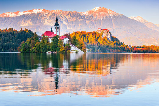 Bled, Slovenia -  Julian Alps and Church Santa Maria, beautiful autumn sunset.
