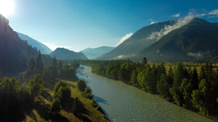 Aerial view of mountain river Katun in Altai region. River flowing through mountains in summer.