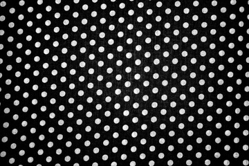 Black matter with white circles. Textile with white circles, pattern.