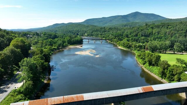 Flying along the Connecticut River and passing over the Cornish Windsor covered bridge.