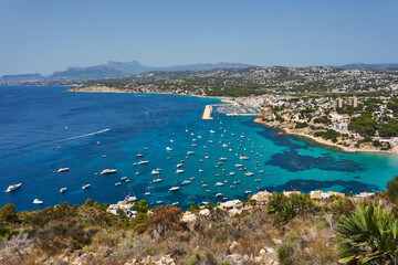 Moraira view from cap d'or with many boats