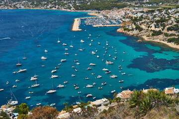 Moraira view from cap d'or with many boats