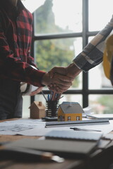 Engineer Teamwork Meeting, Drawing working on blueprint meeting for project working with partner on model building and engineering tools in working site, Construction and structure concept.