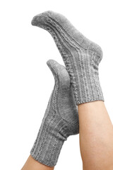 Female legs in grey hand knitted wool socks