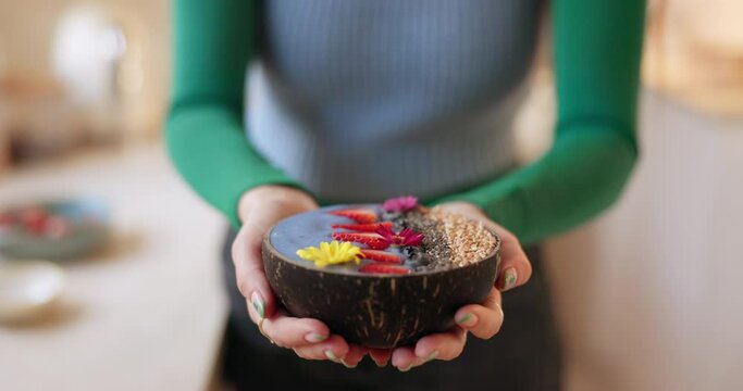 Woman, hands and breakfast bowl in diet, natural nutrition or morning food and muesli for weight loss. Closeup of female person giving healthy organic food, dessert or fruit cereal to lose weight