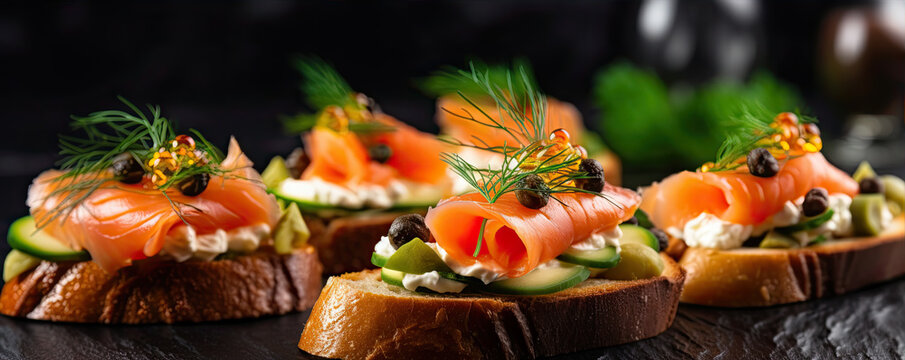 Fresh canapes topped with cheese, smoked salmon on bread.