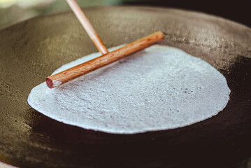 breton galette. buckwheat crepe. making buckwheat pancakes.