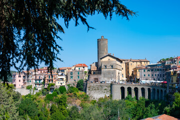 Small historical town Nemi, view on green Alban hills overlooking volcanic crater lake Nemi,...