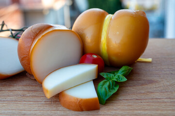 Italian semi hard handmade smoked scamorza cheese, from cow milk from Apulia or Calabria regions...
