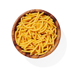 Pasta fusilli noodle in wooden bowl isolated on white, close up