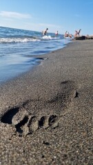 footprints on the beach