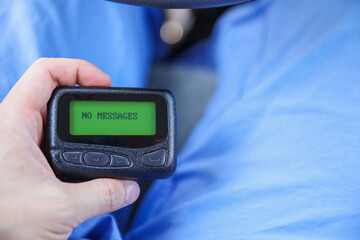 medical communication: A hospital pager signifies instant connection, urgency, and teamwork in healthcare