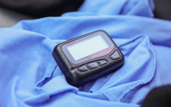 medical communication: A hospital pager signifies instant connection, urgency, and teamwork in healthcare