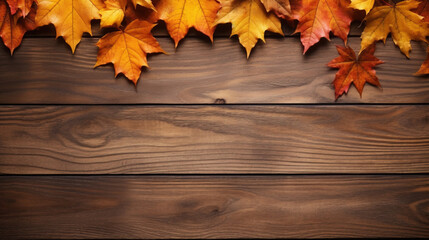 Naklejka na ściany i meble Wooden background with colorful autumn leaves. Autumn background with copy space.